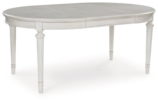 Montelaine Dining Extension Table - Furniture Stars (Chicago, IL)